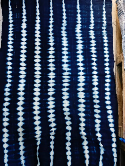 Blue Indigo Mud Cloth or Bogolan Fabric with white zigzag patterns